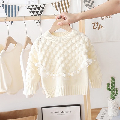 Παιδικό μοντέρνο πουλόβερ με οβάλ ντεκολτέ και φούντες