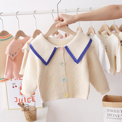 Napi gyerekmellény színes gombokkal