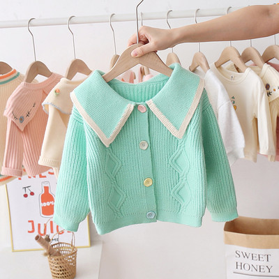 Napi gyerekmellény színes gombokkal