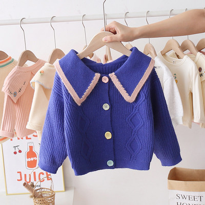 Napi gyerekmellény színes gombokkal