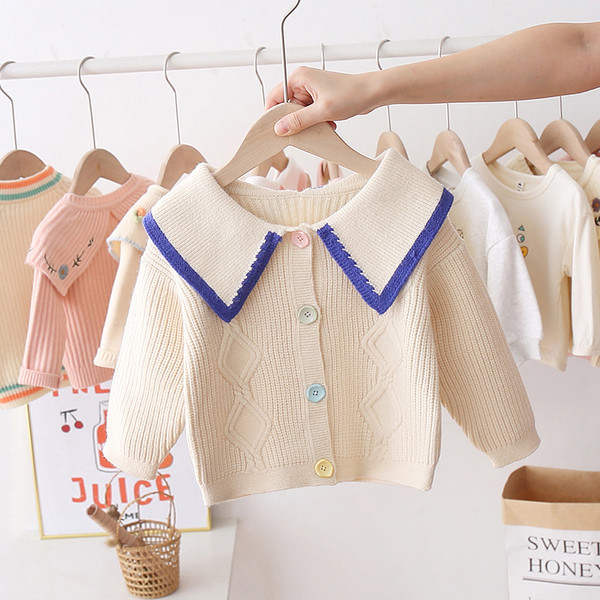 Napi gyerekmellény színes gombokkal