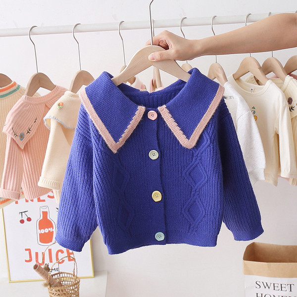 Napi gyerekmellény színes gombokkal