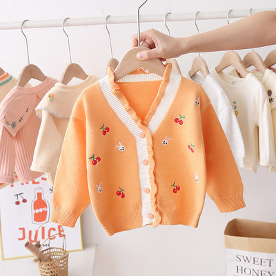 Aktuális gyerekmellény lányoknak V-alakú gallérral és hímzéssel