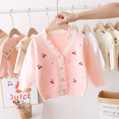 Aktuális gyerekmellény lányoknak V-alakú gallérral és hímzéssel