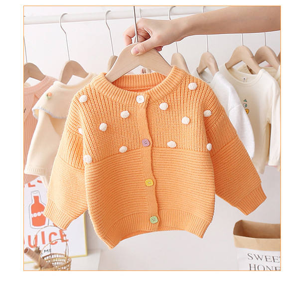 Alkalmi gyerekmellény lányoknak ovális gallérral és színes gombokkal