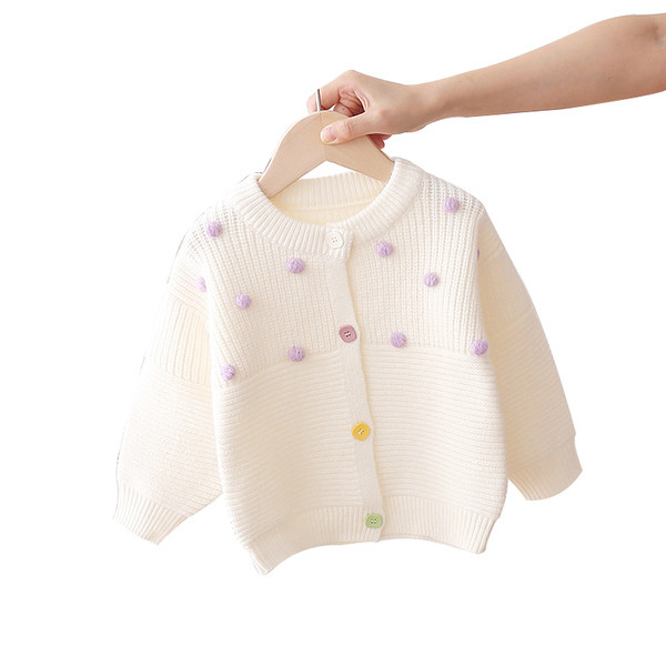 Alkalmi gyerekmellény lányoknak ovális gallérral és színes gombokkal