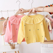 Kötött gyerekkardigán lányoknak gombokkal és hímzéssel