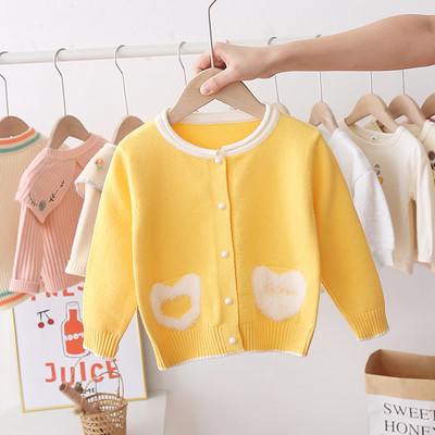 Uut mudelit ovaalse kraega ja udusulgedega lastevest tüdrukutele