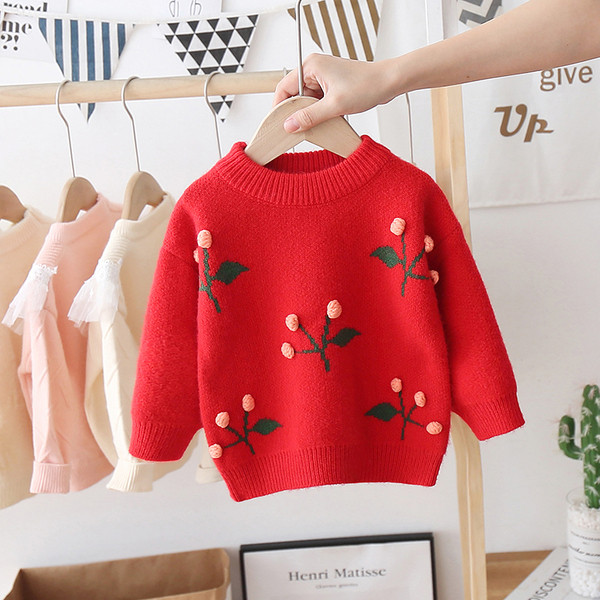 Alkalmi gyerekpulóver kerek nyakkivágással, színes mintával, lányoknak is megfelelő