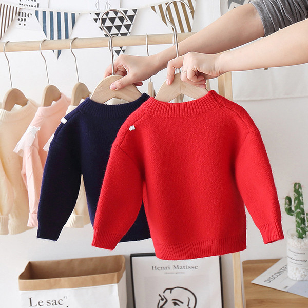 Alkalmi gyerekpulóver kerek nyakkivágással, színes mintával, lányoknak is megfelelő