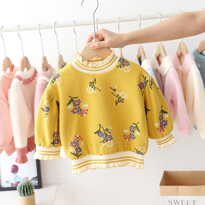 Modern gyerekpulóver lányoknak magas gallérral és virágmotívumokkal