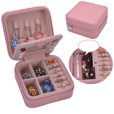 Juvelierizstrādājumu kastīte ar rāvējslēdzēju un nodalījumu gredzeniem un auskariem