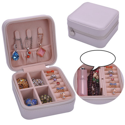 Juvelierizstrādājumu kastīte ar rāvējslēdzēju un nodalījumu gredzeniem un auskariem
