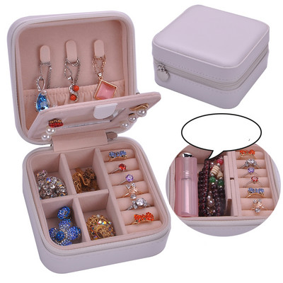 Juvelierizstrādājumu kastīte ar rāvējslēdzēju un nodalījumu gredzeniem un auskariem