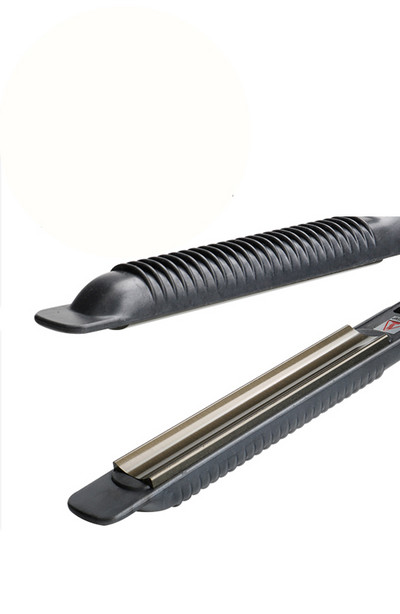 Nedidelis nešiojamas tiesintuvas skirtas plaukams tiesinti arba apimti