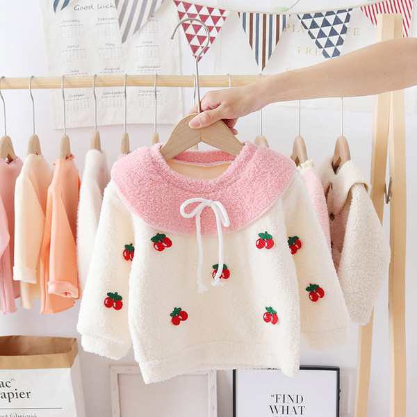 Dječji puhasti pulover s vezama za djevojčice