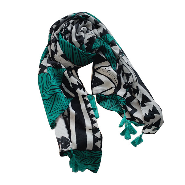 Lezser női téli sál színes mintával és bojttal