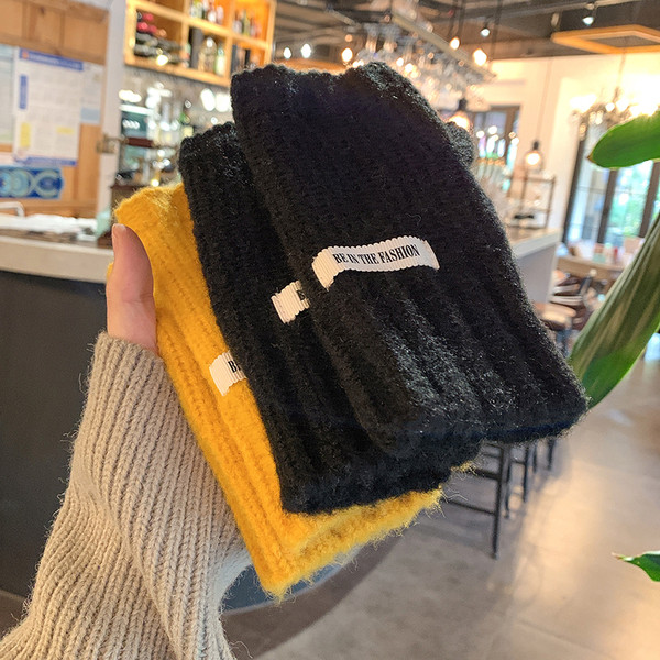 Női alkalmi kesztyű emblémával