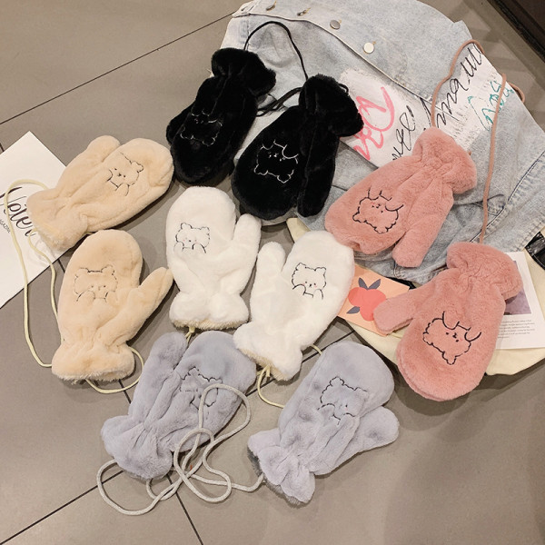 Női pehelykesztyű hímzéssel és nyakkendővel