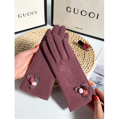 Ženske vunene rukavice s perom