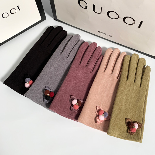 Ženske vunene rukavice s perom