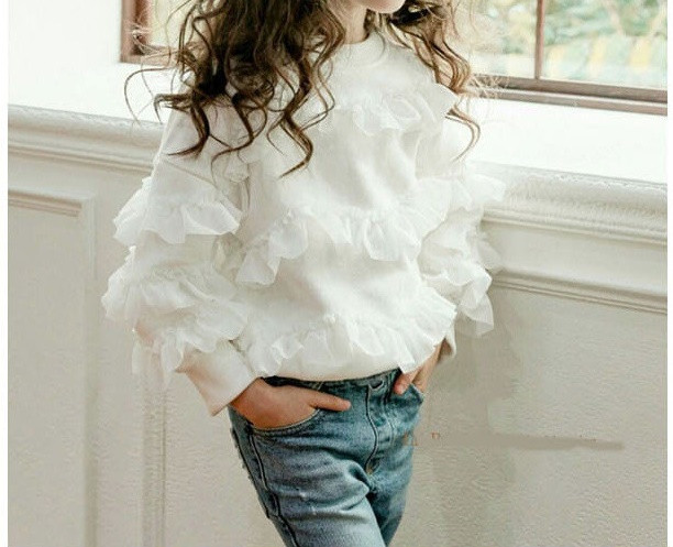 Modern, ovális nyakkivágású gyerekblúz lányoknak