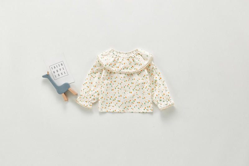 Modern gyerekblúz ovális nyakkivágással és hosszú ujjal