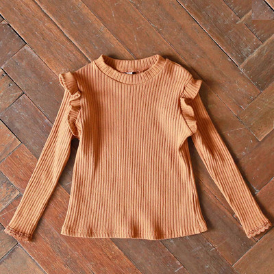 Modern gyermekblúz modell hosszú ujjal és ovális nyakkivágással