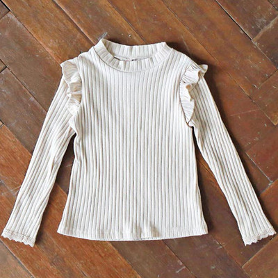 Modern gyermekblúz modell hosszú ujjal és ovális nyakkivágással