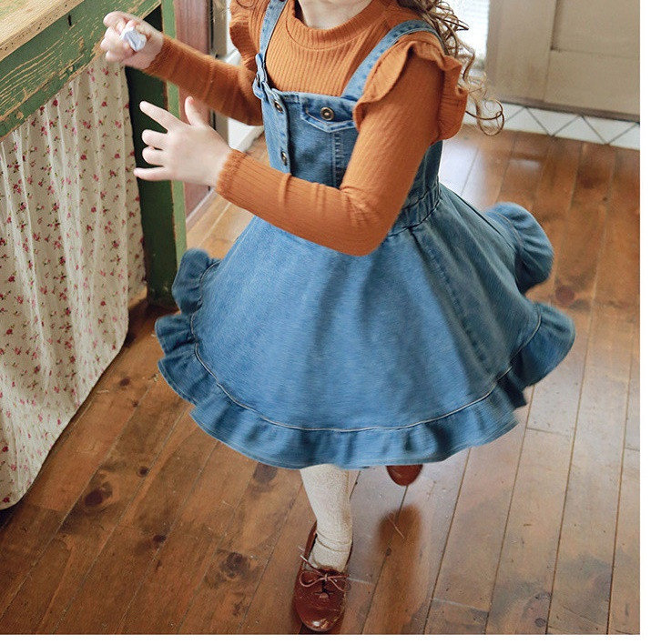 Modern gyermekblúz modell hosszú ujjal és ovális nyakkivágással