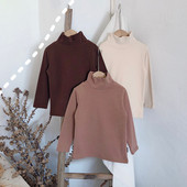 Alkalmi gyermekblúz lányoknak magas gallérral