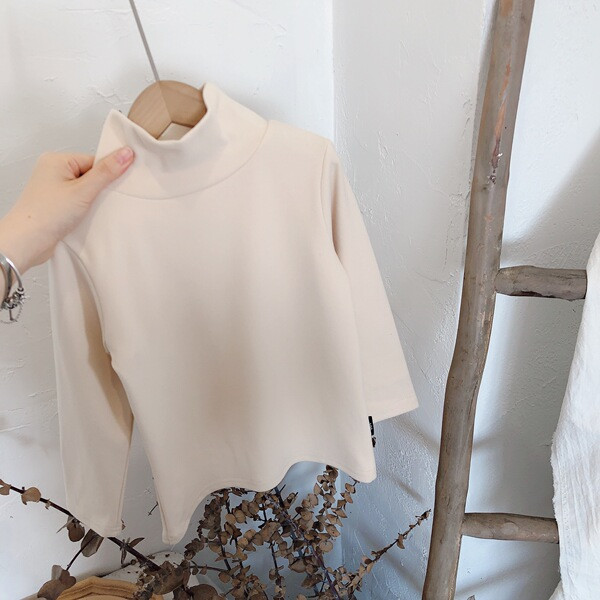 Alkalmi gyermekblúz lányoknak magas gallérral