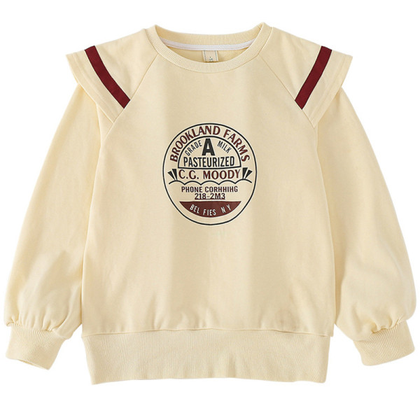 Aktuális gyerekblúz rátéttel és ovális nyakkivágással