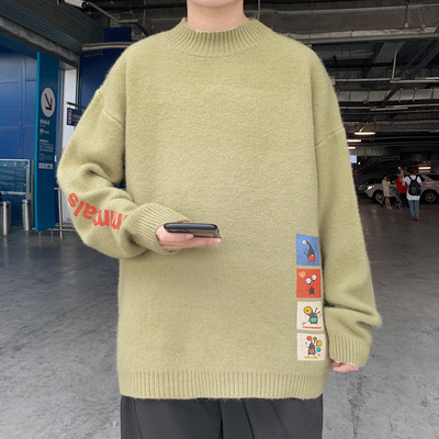 Vastag téli pulóver színes applikációkkal