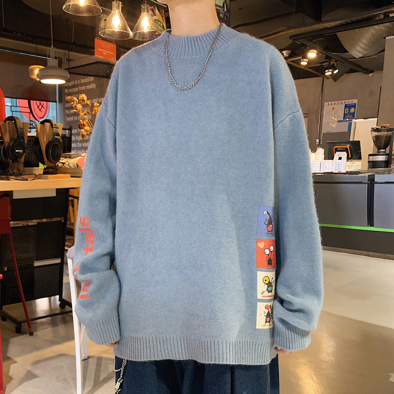 Vastag téli pulóver színes applikációkkal