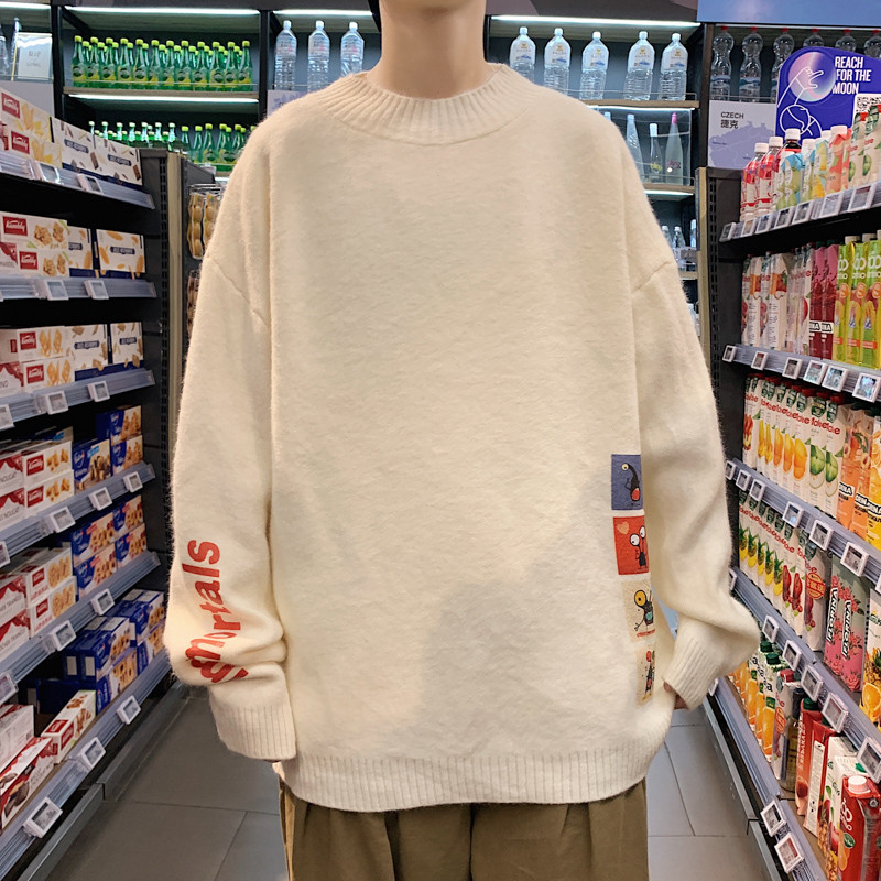 Vastag téli pulóver színes applikációkkal