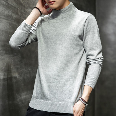 Vékony kötésből készült pólógallérral ellátott pulóver