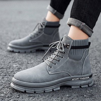 Meeste nahast saapad tekstiilist osa ja kirjadega