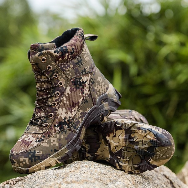 Men`s boots with camouflage pattern and laces