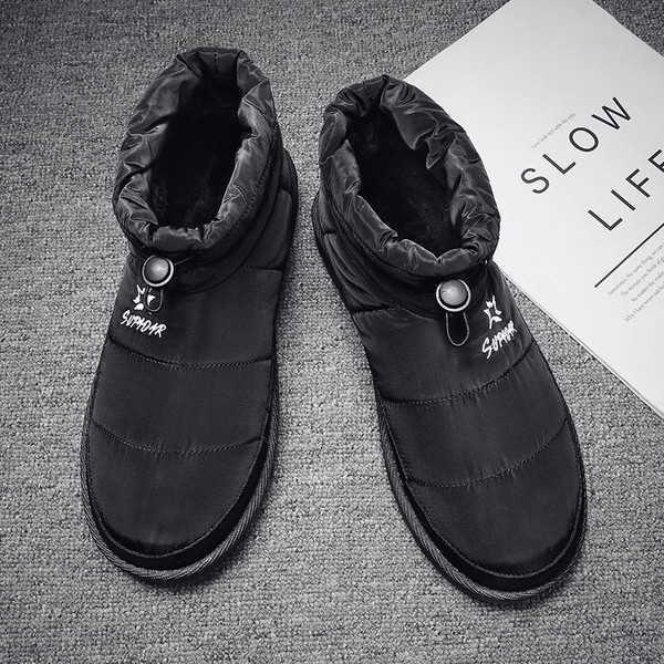 Kolmes värvitoonis tikanditega paeltega meeste saapad