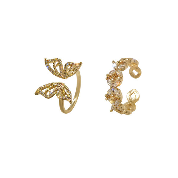 Naiste topiksõrmus kahes mudelis liblika ja kivikestega