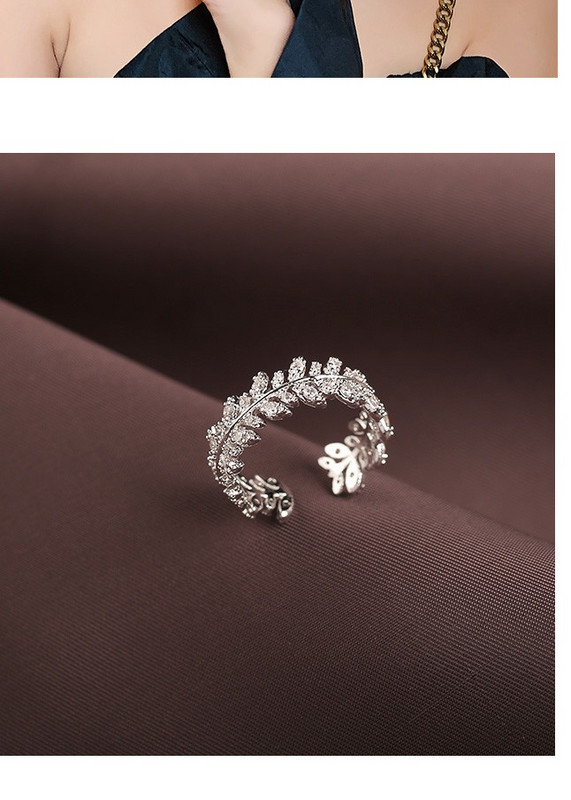 Stiilne naiste sõrmus dekoratiivkividega