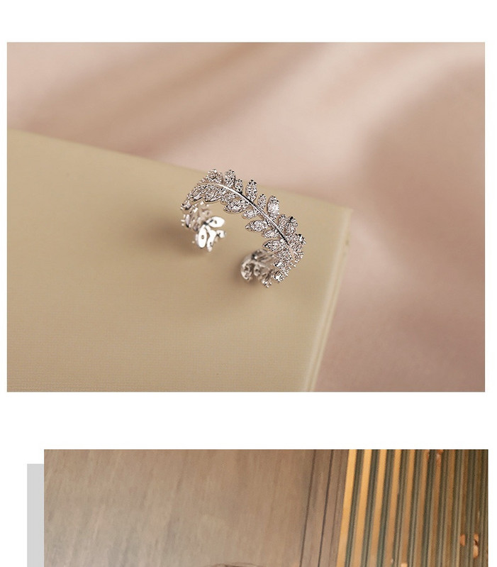 Stiilne naiste sõrmus dekoratiivkividega