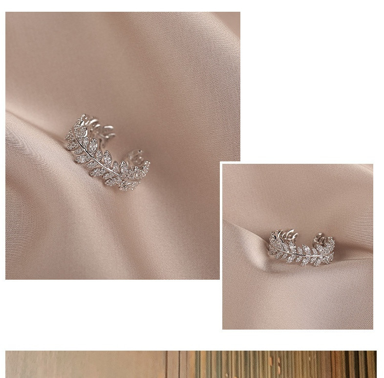 Stiilne naiste sõrmus dekoratiivkividega