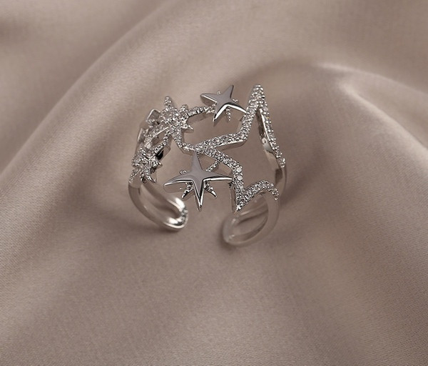 Igapäevane naiste sõrmus tähtede ja dekoratiivkividega