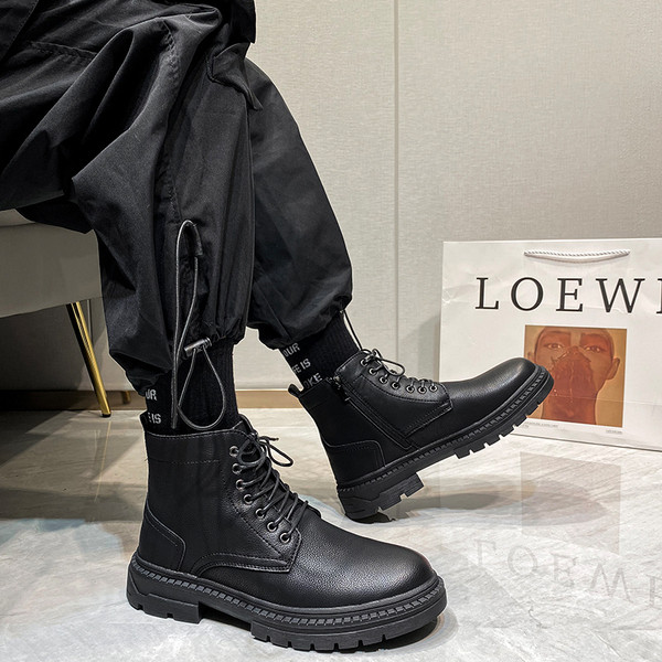 Meeste musta värvi paeltega nahast saapad