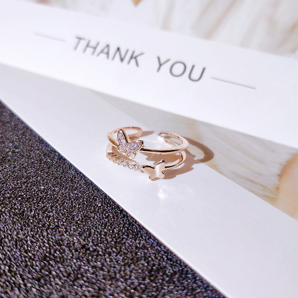 Naiste moodne liblika ja dekoratiivkividega sõrmus