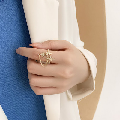 Модерен дамски пръстен с верижка и камъни