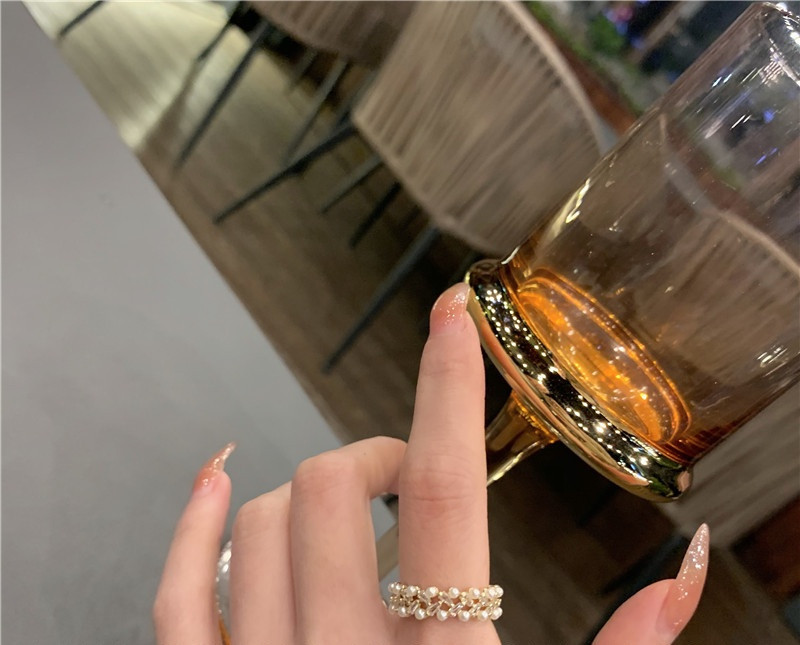 Női topikus gyűrű széles modell dekorgyöngyökkel