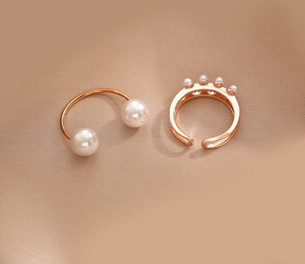 Kahe pärlitega naiste sõrmuse komplekt